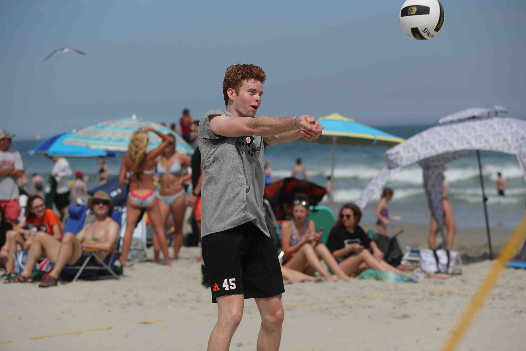 Philadelphia Flyers prospects sign autographs and play volleyball